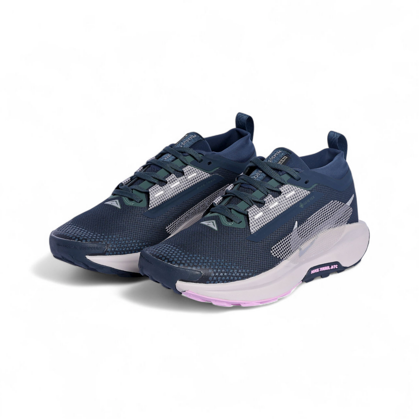 Pair of navy running shoes with white sole on a white background