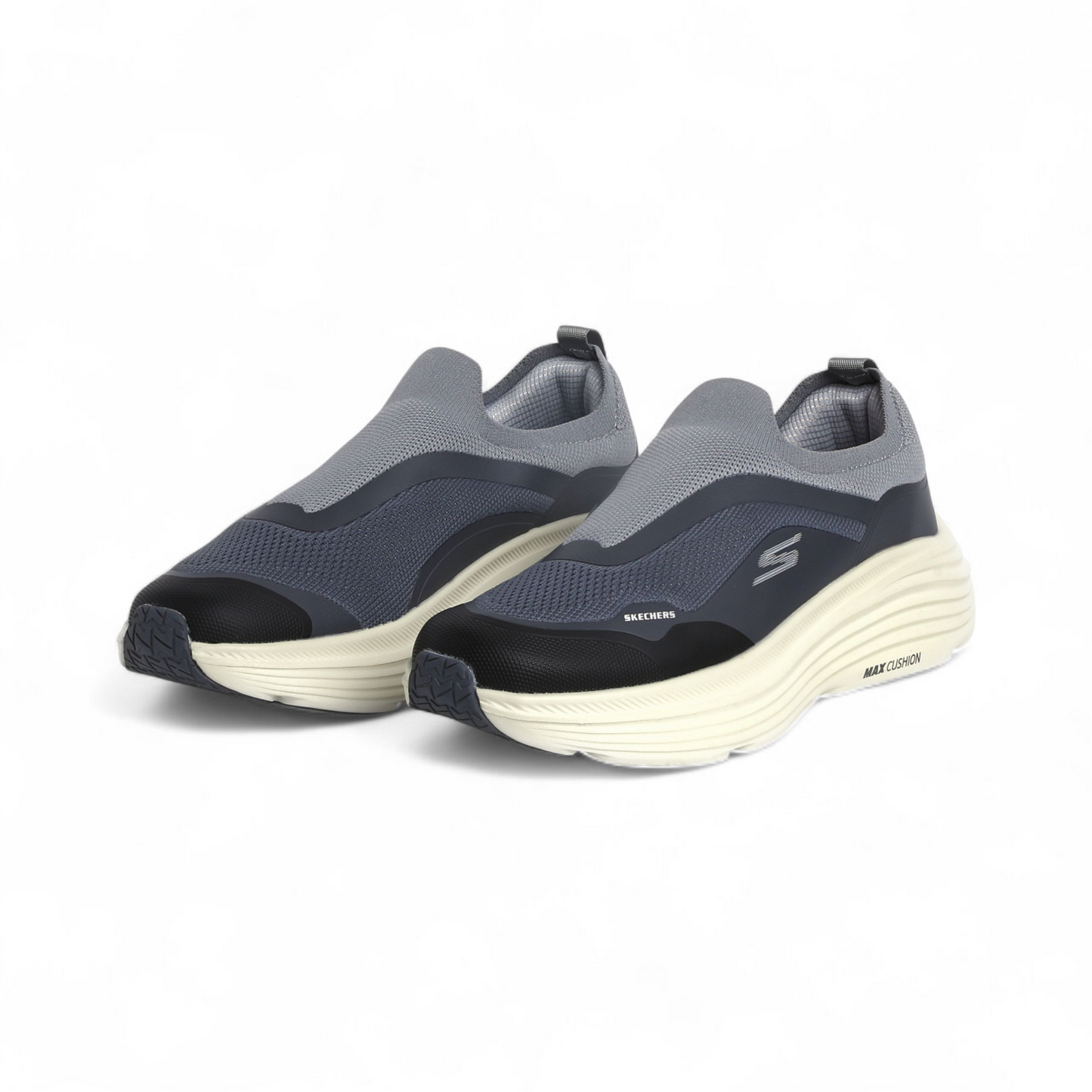 Gray and black sneakers with white soles on a white background
